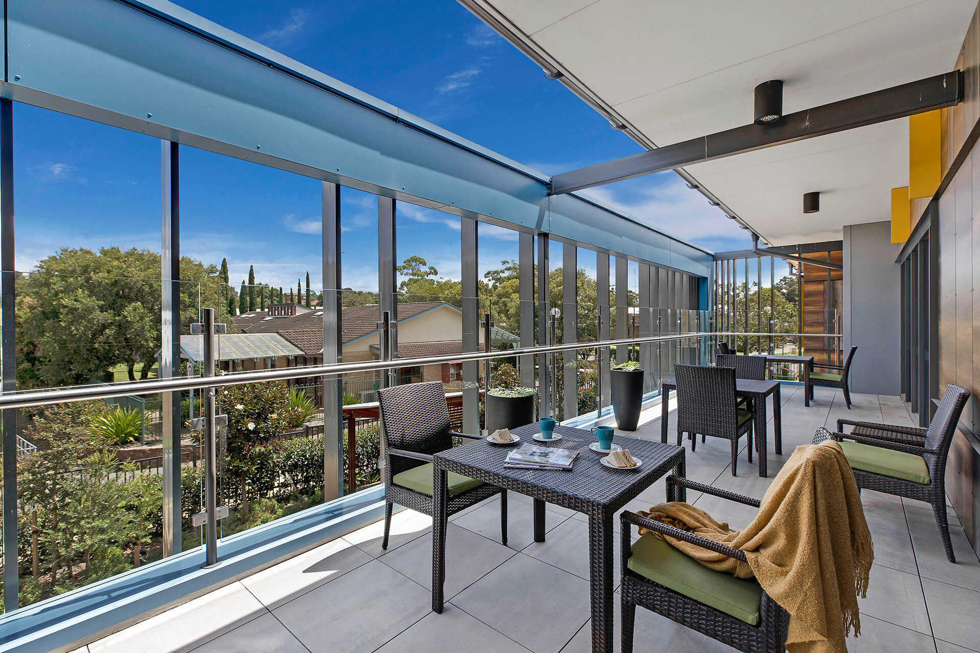 Cafe seating area overlooking gardens below